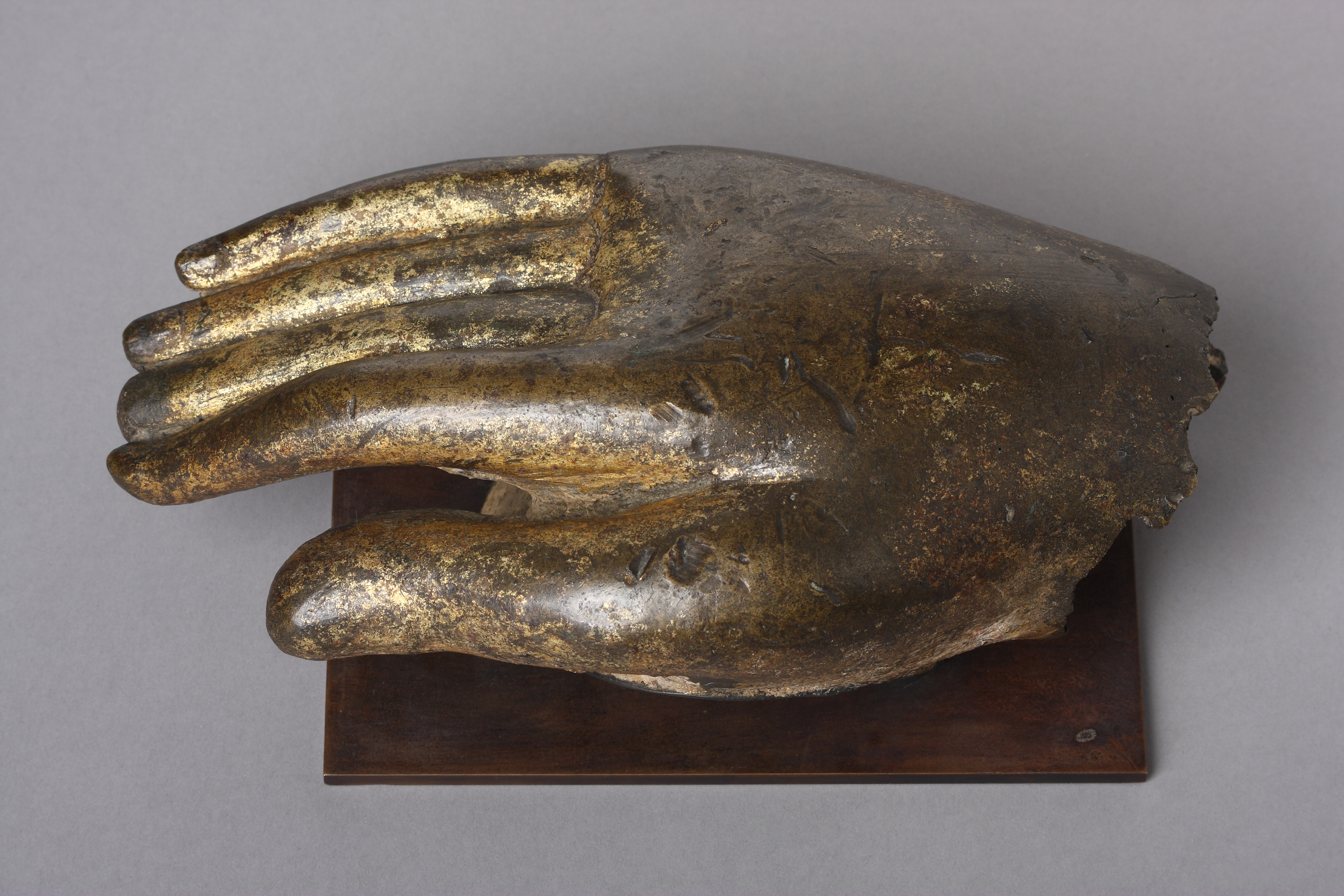 A Heavy Cast Gilded Bronze Right Hand of the Buddha Shakyamuni